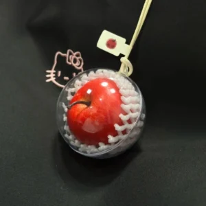 Encapsulated Apple Bag Charm – Handcrafted Fruit Ball Keychain with Protective Net