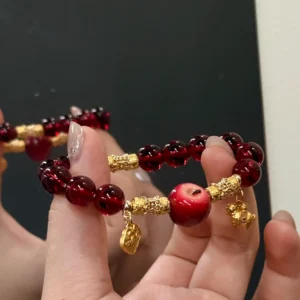 Golden Fortune Red Apple Bracelet – Handcrafted Crimson Gemstone & Filigree Charm Wristlet